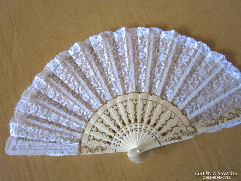 Old white lace fan