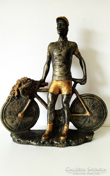 Vintage bronzed resin statue of Hubert Opperman