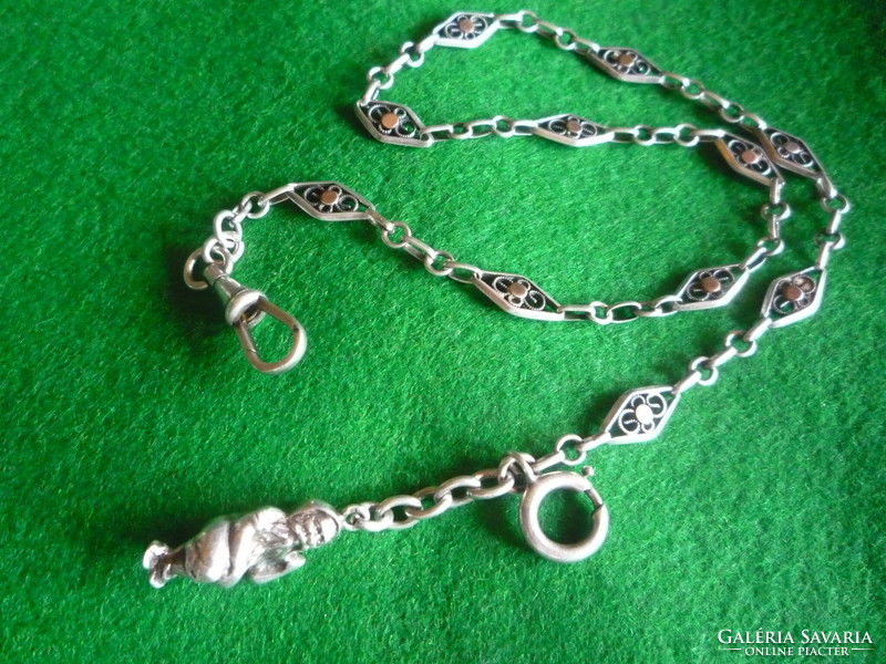 Silver watch chain.