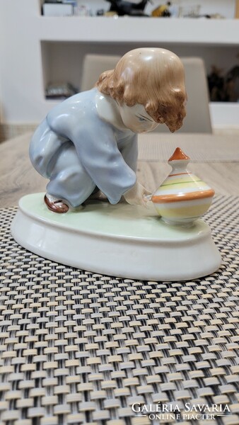 Zsolnay porcelain figure. Child with a snail.
