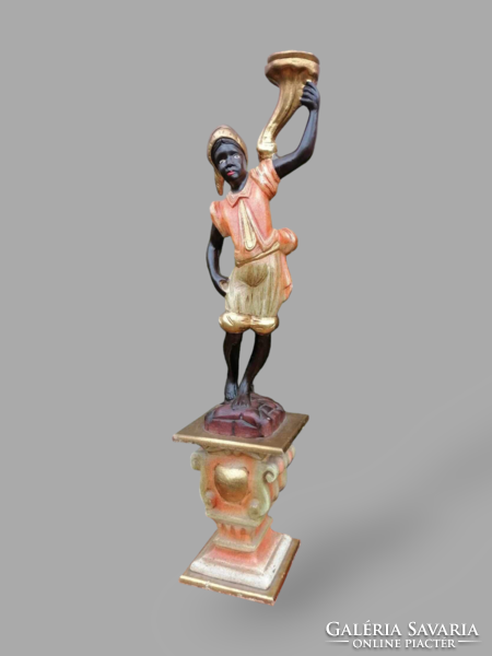 Wooden sculpture candle holder African man