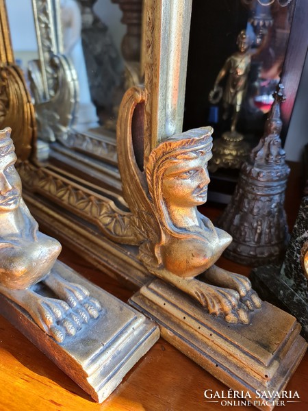 Pair of old mirrors, with two sphinxes at the foot of each mirror