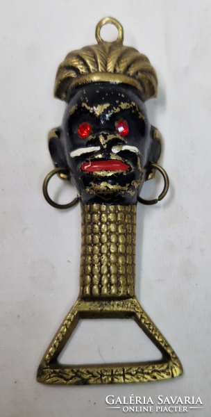 Old, copper, special-shaped beer opener, with a hanger, with a depiction of a tribal warrior, 11.5 cm.