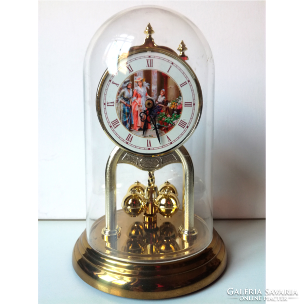 Table clock with rotating pendulum, hammering, baroque pattern