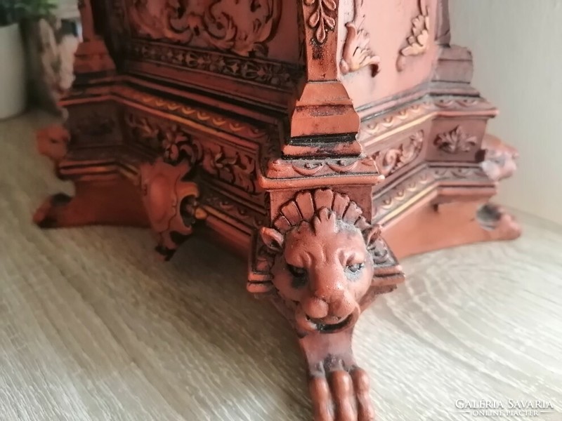 Beautifully detailed wooden fireplace clock in the shape of a female lion