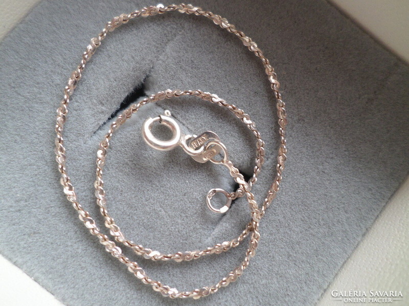 Silver bracelet with twisted pattern