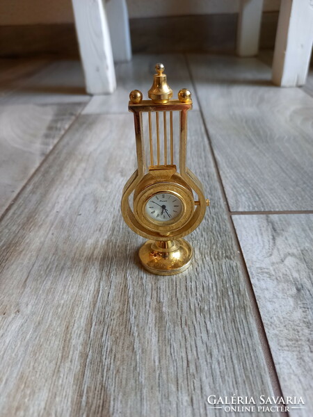 Interesting old metal clock (10x4.3x3 cm)