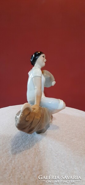 Porcelain statue. Lady on a Rock. Hand-painted statue, 15.5 cm high. Presumably North Korean.