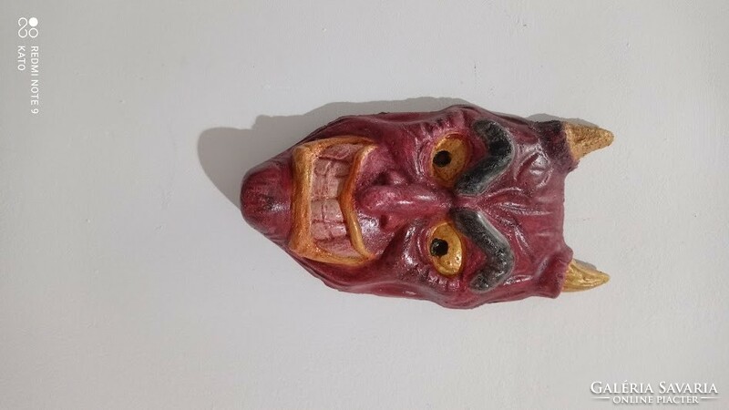 Devil's head wall decoration, face with bloody teeth, mask, mask-like decoration