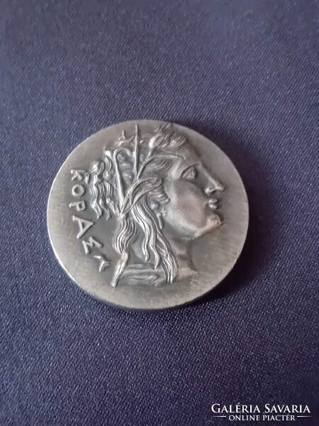 Ancient Greek coin kopam