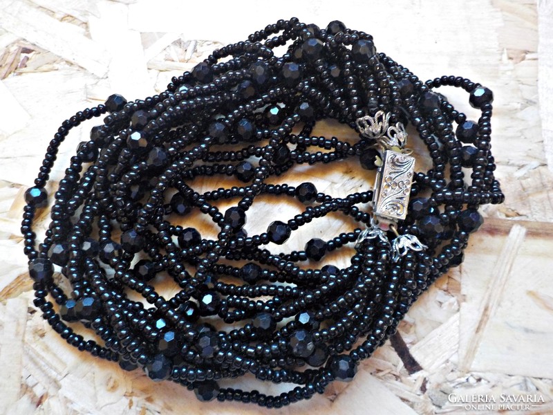Old multi-row necklace with black glass beads