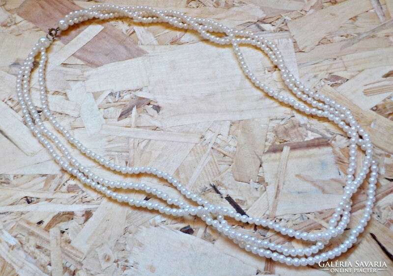 Multi-row white plastic tekla beads