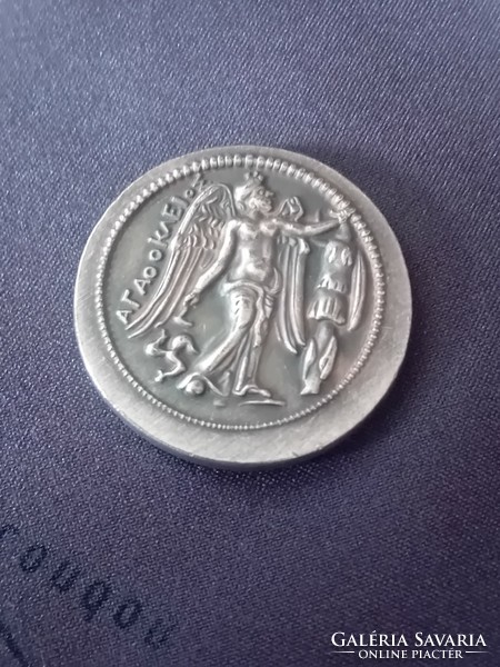 Ancient Greek coin kopam