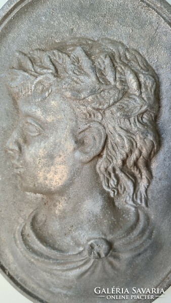 Oval image, metal aluminum, female face