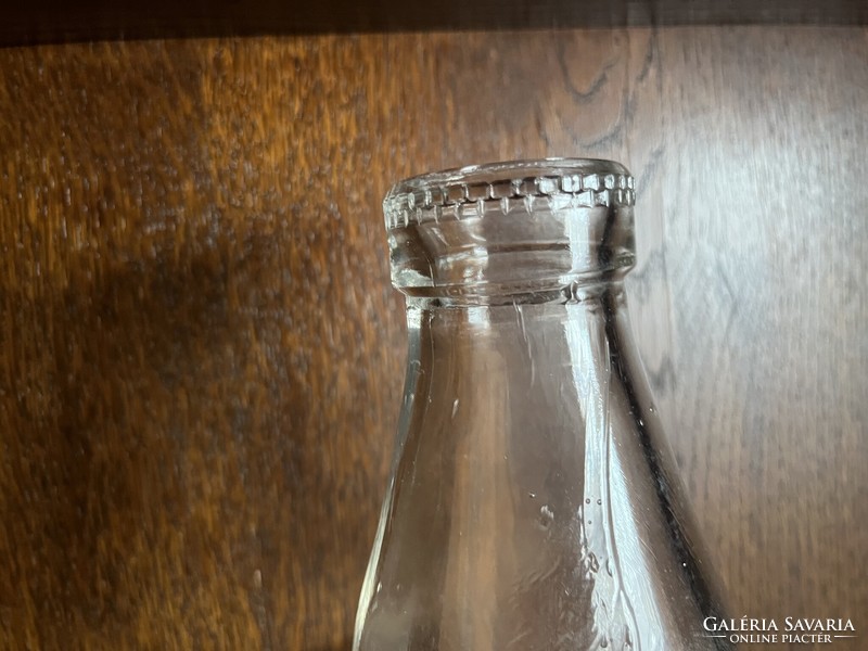 Old ribbed neck milk bottle / pasteurized milk
