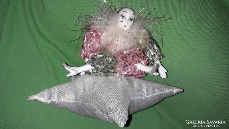 Beautiful porcelain baby pierot figure sitting on a silver star pillow 14 cm according to the pictures
