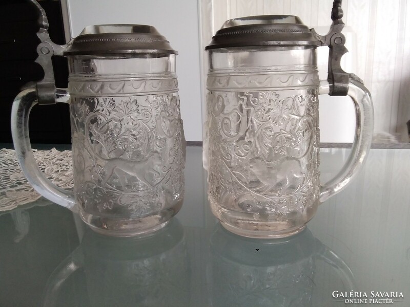 A very rare glass lidded 0.5 l beer mug with a crystal lid, in a pewter socket with a kozel ram's head.