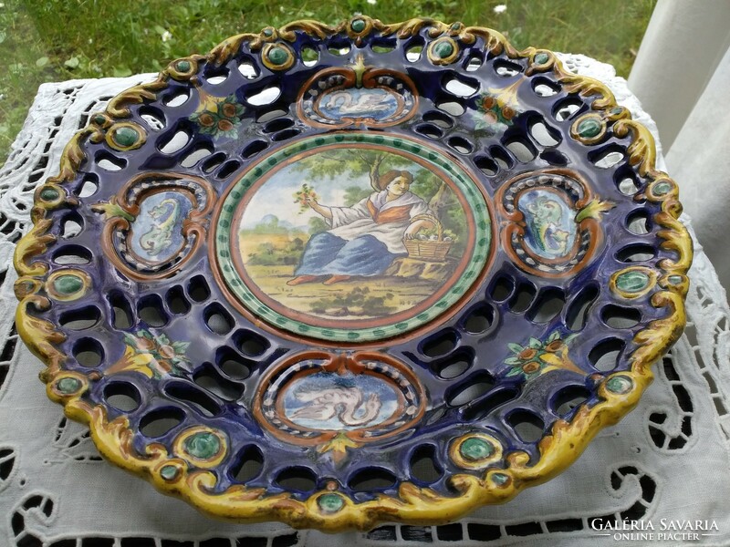 Hand-painted, pewter-glazed openwork cobalt blue antique majolica wall plate