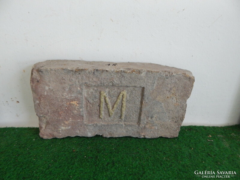 Antique bricks with the year 1852, monogrammed, m, and mm. No. 18.