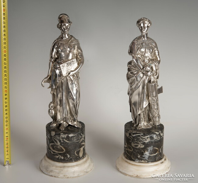 Silver statue of Pallas Athena on a marble plinth