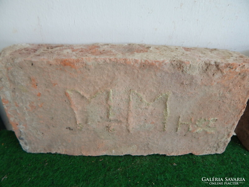Antique bricks with the year 1852, monogrammed, m, and mm. No. 18.