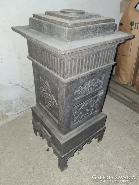 Cast iron stove with a nice pattern. Never used.