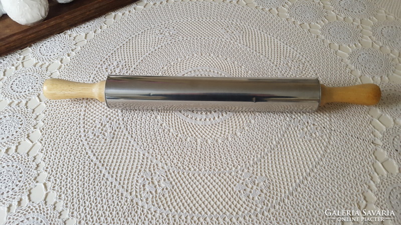 Metal stretcher with wooden handle, rolling pin