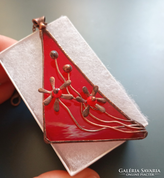 Handmade red glass pendant with small copper flowers