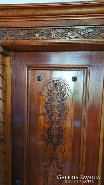 Column carved pewter cabinet with shelves