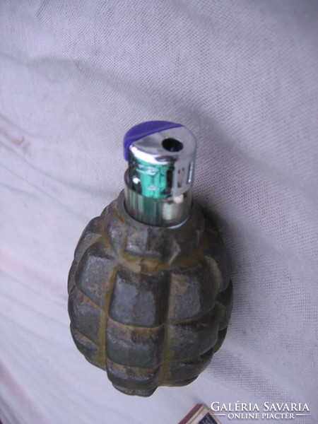Old military souvenir. Hand grenade lighter.