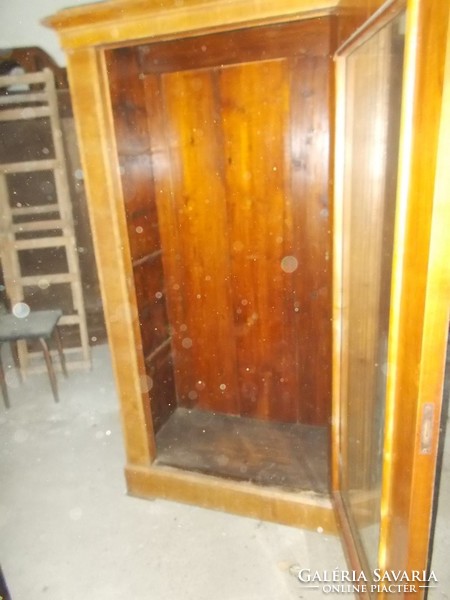 Biedermeier cabinet with glazed front.