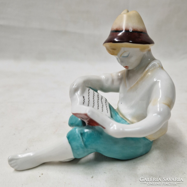 Ravenclaw reading boy porcelain figurine in perfect condition 9 cm.