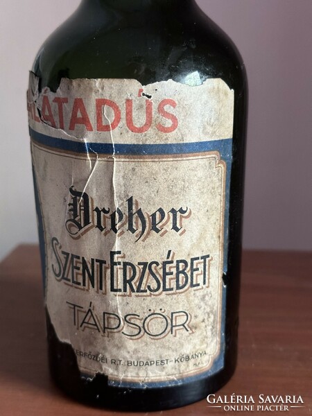 Beer bottle with Dreher label