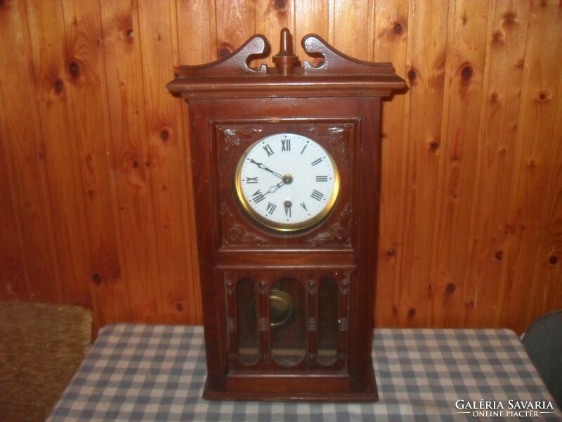 Old pendulum wall clock