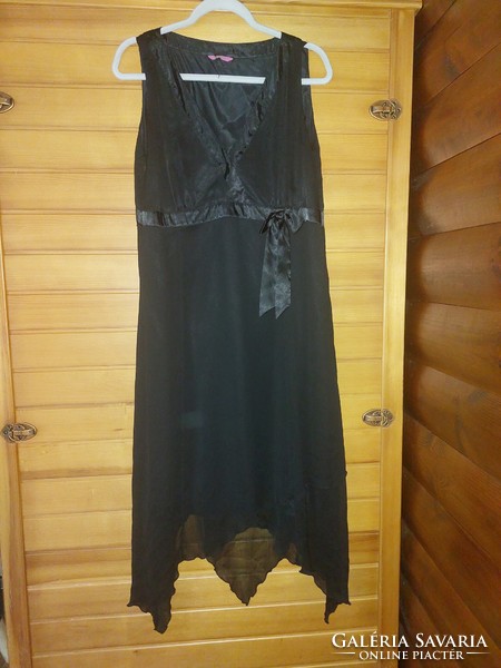 Black asymmetric casual dress. Novel. Chest: opens up to 50-60cm, waist: 50cm.