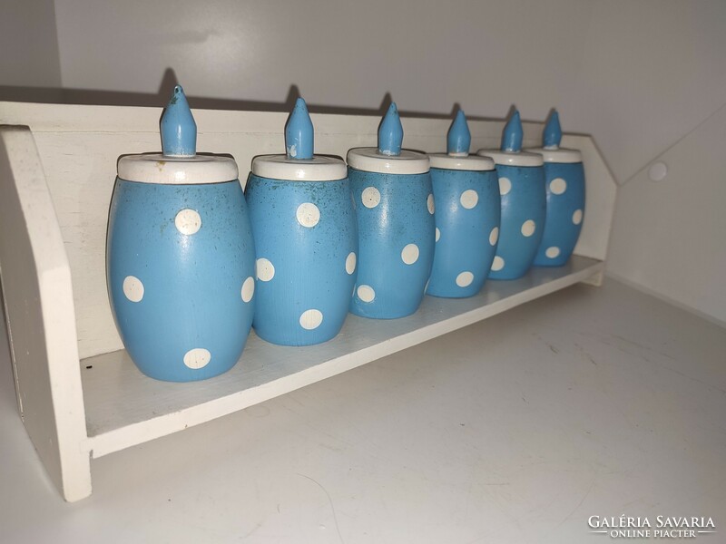 Extra special old folk wooden wall spice holder with blue dots.