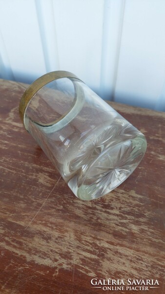 Old, copper-rimmed crystal container