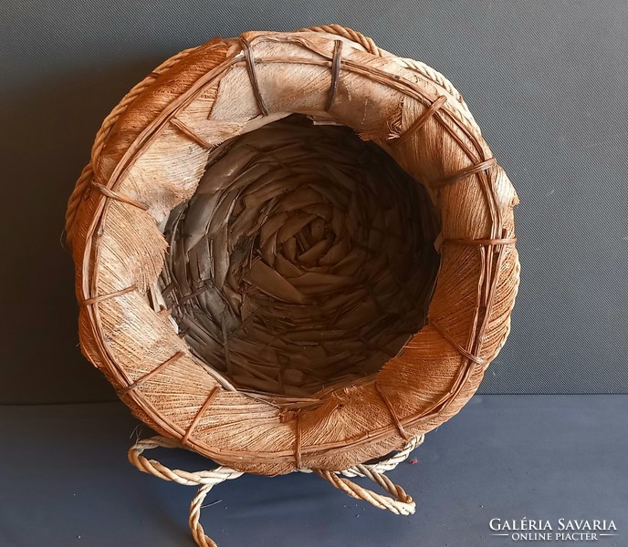 Huge palm leaf and rope holding basket negotiable design