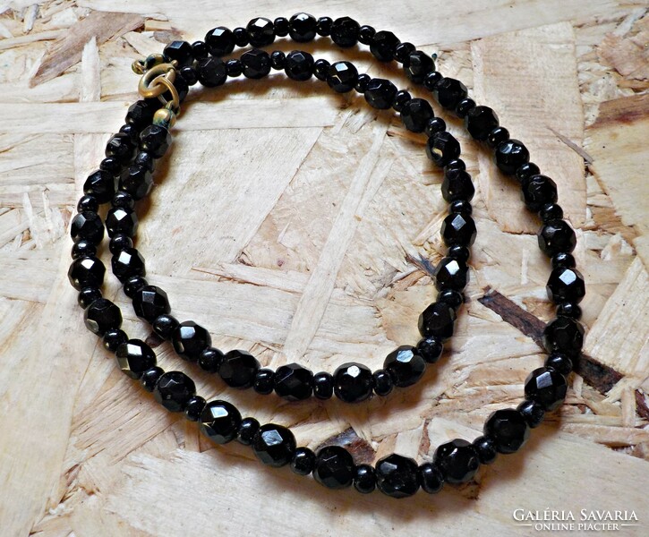 Old black polished glass bead necklace with copper clasp