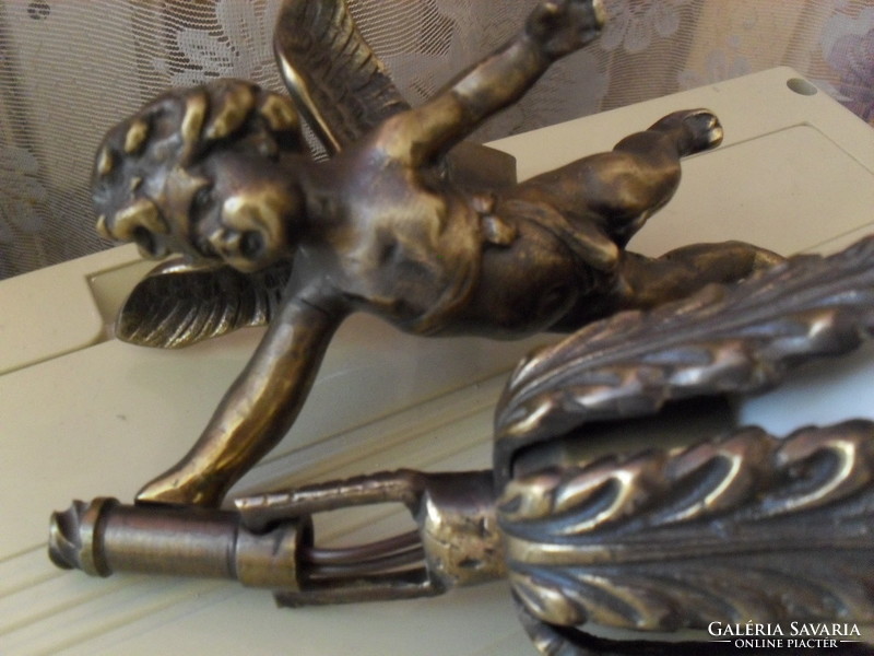 Old bronze angel wall arm