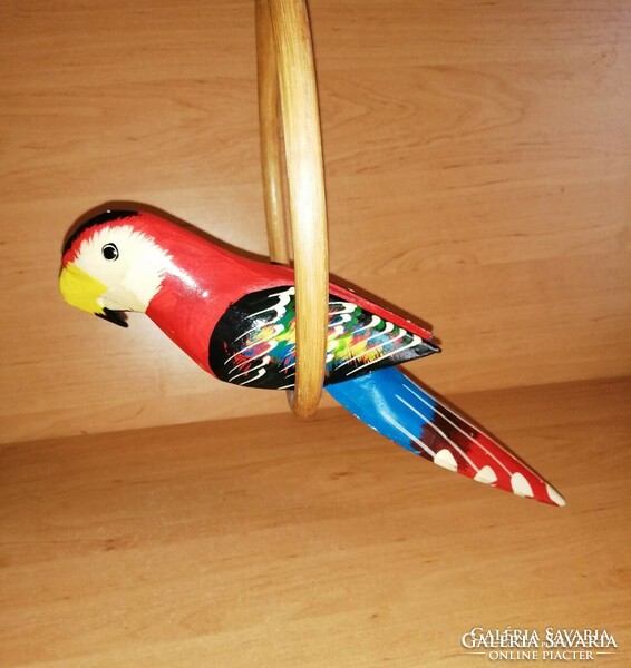 Hanging wooden parrot in a wooden hoop (b)