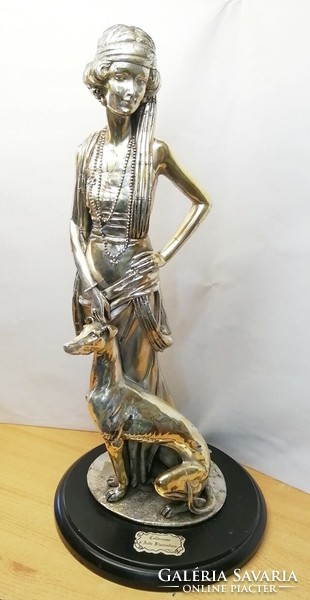 Art nouveau-style silver-plated statue of a lady with a dog is the work of the Italian sculptor auro belcari