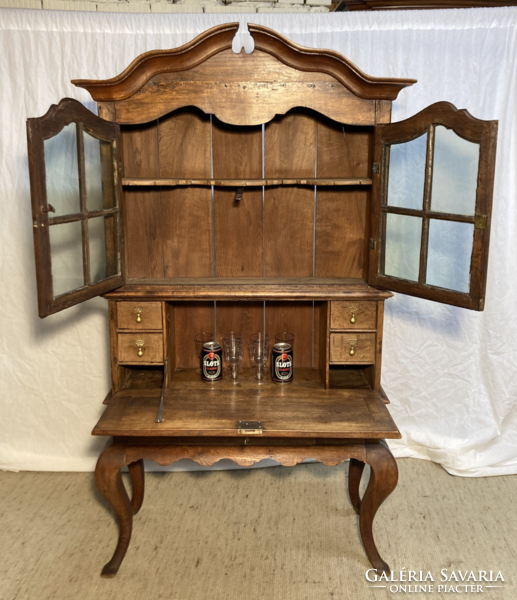 Scottish liquor cabinet with glazed pipe holder