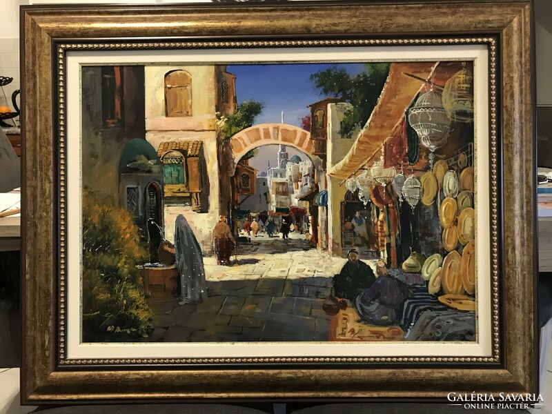 Oil painting/oriental market scene, in a gilded frame.