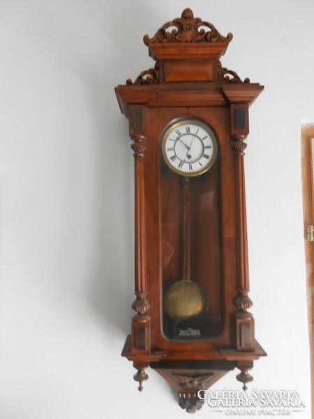 Antique push-in spring wall clock