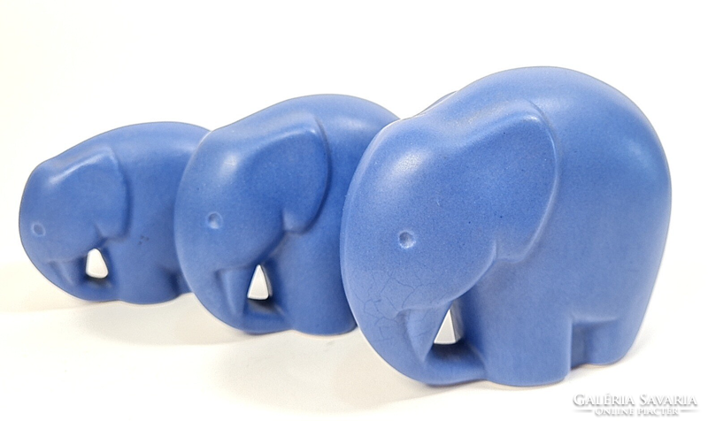 Charming, modern ceramic elephant trio