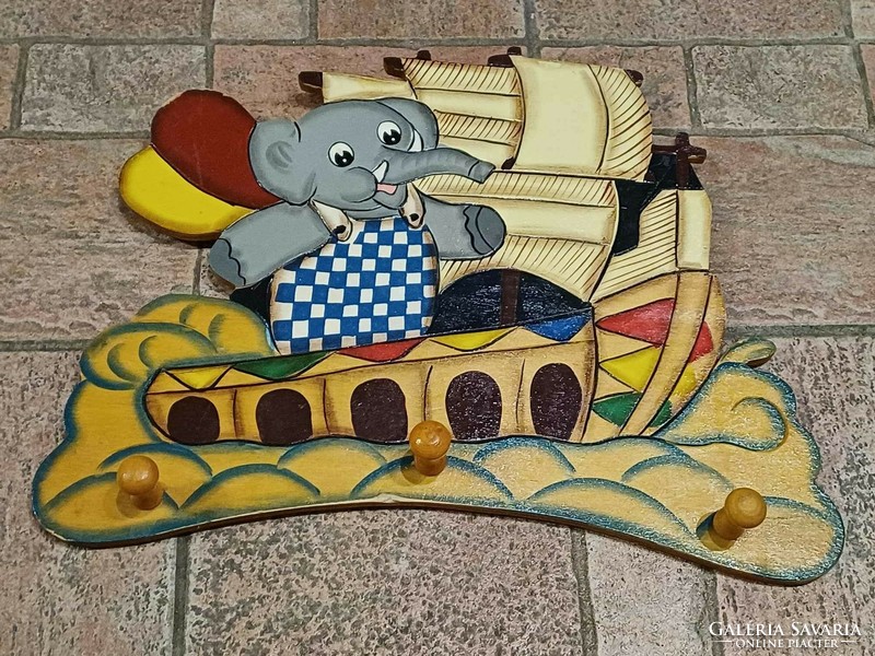 Retro wooden children's coat hanger elephant on the boat