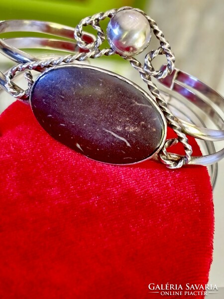 Stunning silver bangle with reddish brown mineral stone