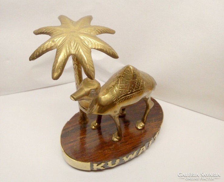 Bronze dromedary with palm tree, on lacquered wooden pedestal, Kuwaiti souvenir