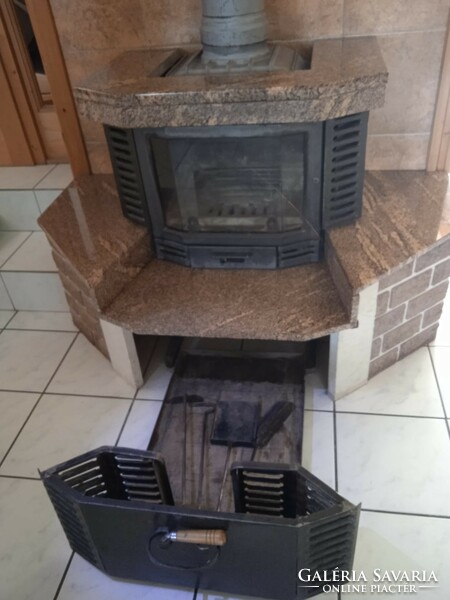 Fireplace, unique, made of mobilizable elements, rolling wood storage, acid flue, with console, etc.